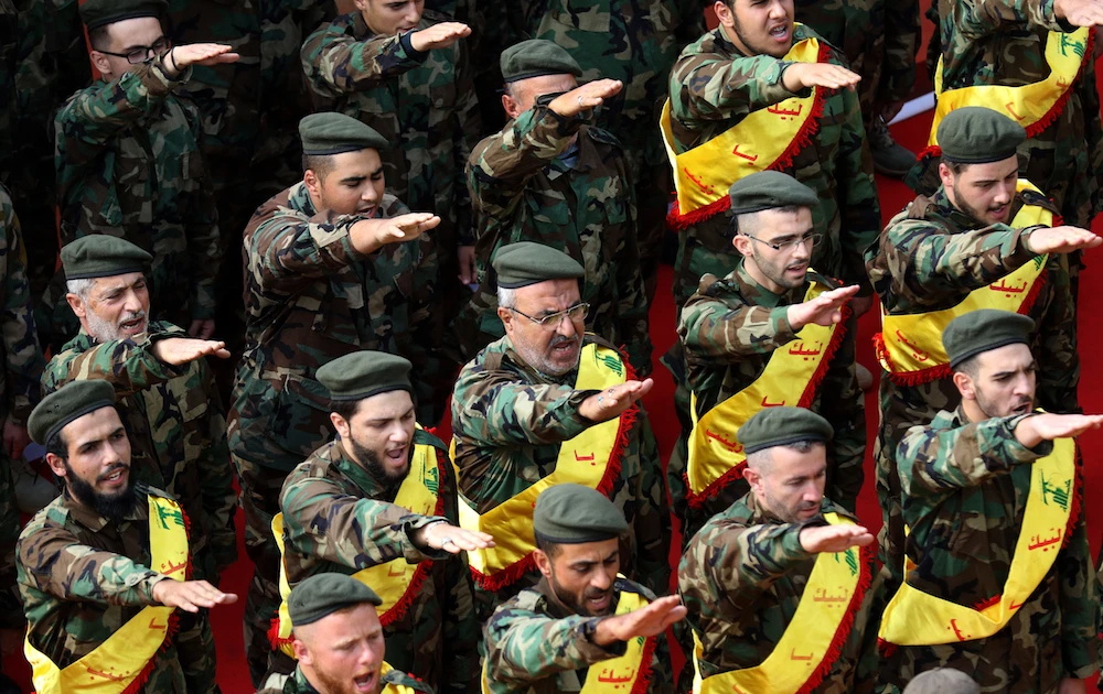UN Secretary-General Antonio Guterres called on the Lebanese government to prevent Hezbollah and other groups from owning weapons in a report issued by the UN on Friday. (File/ AFP)