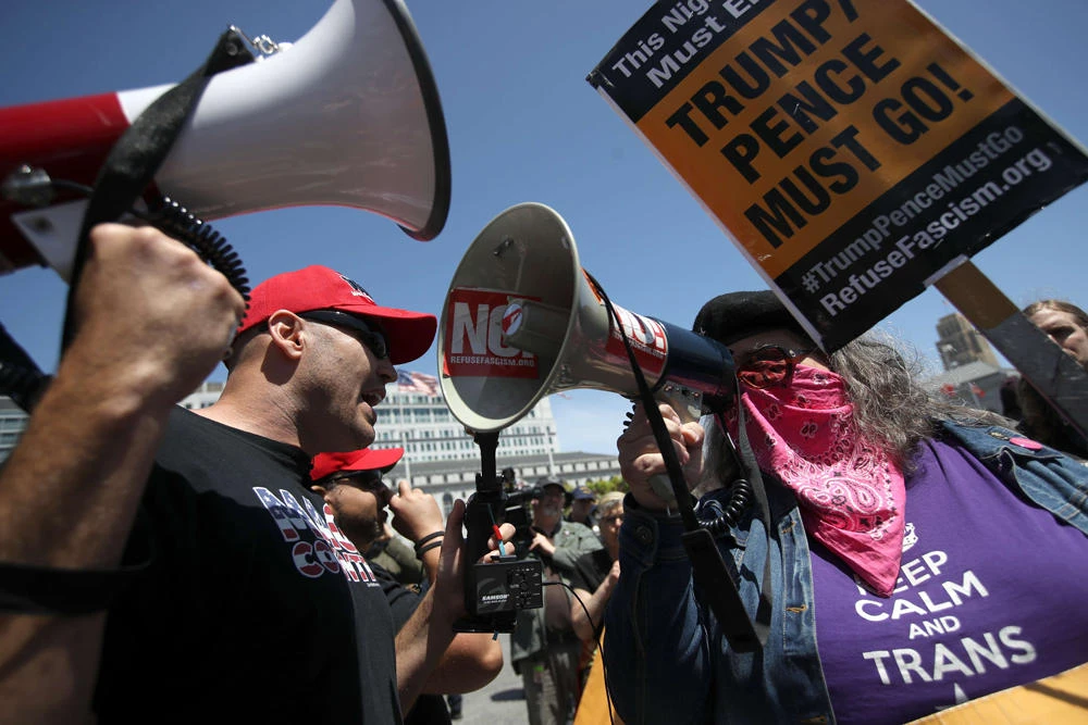Far right activists square off with anti-fascist protesters during a freedom of speech rally in front of City Hall on May 03, 2019 in San Francisco, California. Dozens of far right activists staged a freedom of speech rally in front of City Hall a day after Facebook permanently banned several alt-right personalities from the social media platform. (Justin Sullivan/Getty Images/AFP)