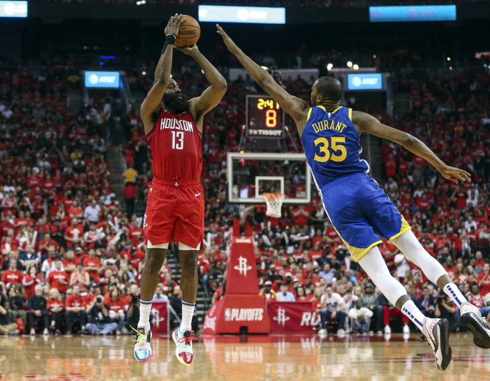Houston Rockets guard James Harden shoots the ball as Golden State Warriors forward Kevin Durant defends during the third quarter in game three of the second round of the 2019 NBA Playoffs at Toyota Center in Houston, Texas. (Troy Taormina-USA TODAY Sports)
