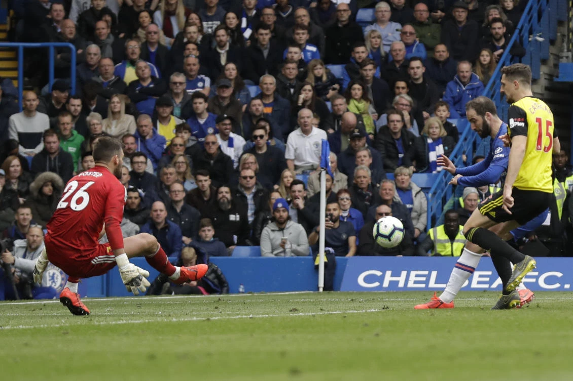 Chelsea’s Gonzalo Higuain, second from right, scores his side’s third goal during the English Premier League soccer match between Chelsea and Watford at Stamford Bridge stadium. (AP Photo)