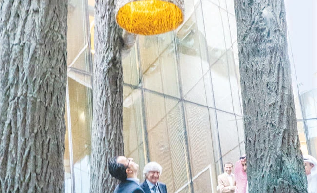 The 90-foot tall artwork consists of three towering bronze ‘trees’ that ‘grow’ from the base of the Source, the physical core of Ithra. (AN photo by Ziyad Alarfaj)