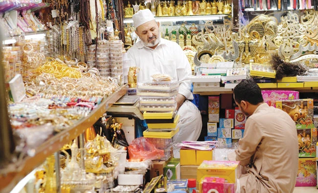The discount “abu riyaleen” outlets are as important as supermarkets to many citizens during Ramadan. (Shutterstock)