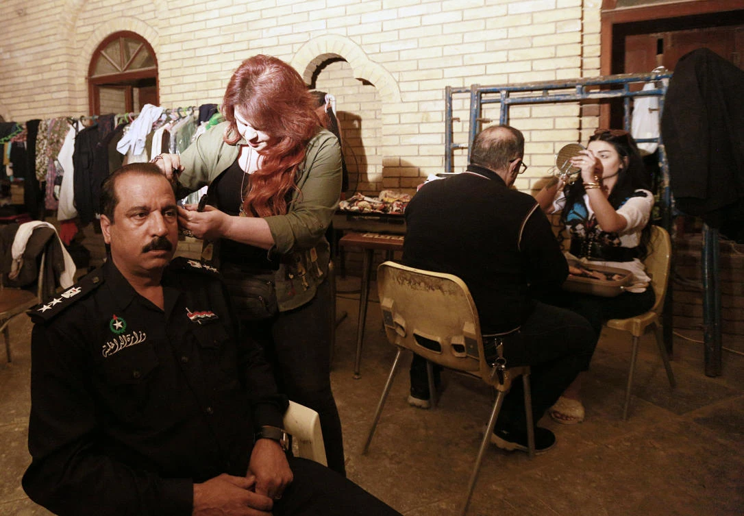 Iraqi actors prepare to perform their roles in ‘The Hotel’ in Baghdad. ‘The Hotel’ is Iraq’s first TV drama in seven years. (AP Photo)