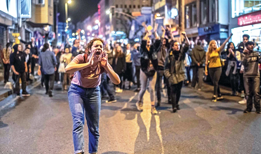 Supporters of Istanbul Mayor Ekrem Imamoglu shout anti-government slogans as they take part in a protest against the re-run of Istanbul mayoral election. AFP
