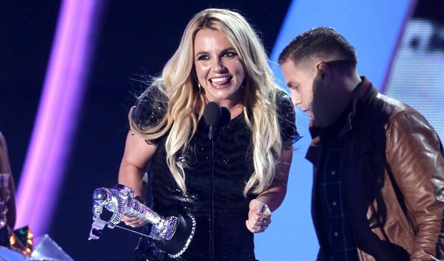 Britney Spears, shown accepting an award at the MTV Video Music Awards in this Aug. 28, 2011, photo, iA judge ordered 44-year-old Sam Lutfi, who has been in legal fights with the Spears family for a decade. (AP Photo/Matt Sayles)