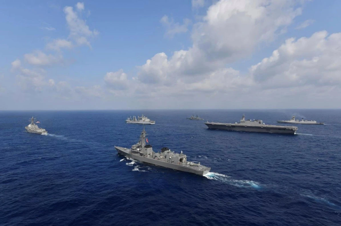 Vessels from the US Navy, Indian Navy, Japan Maritime Self-Defense Force and the Philippine Navy sail in formation at sea. (File/Reuters)