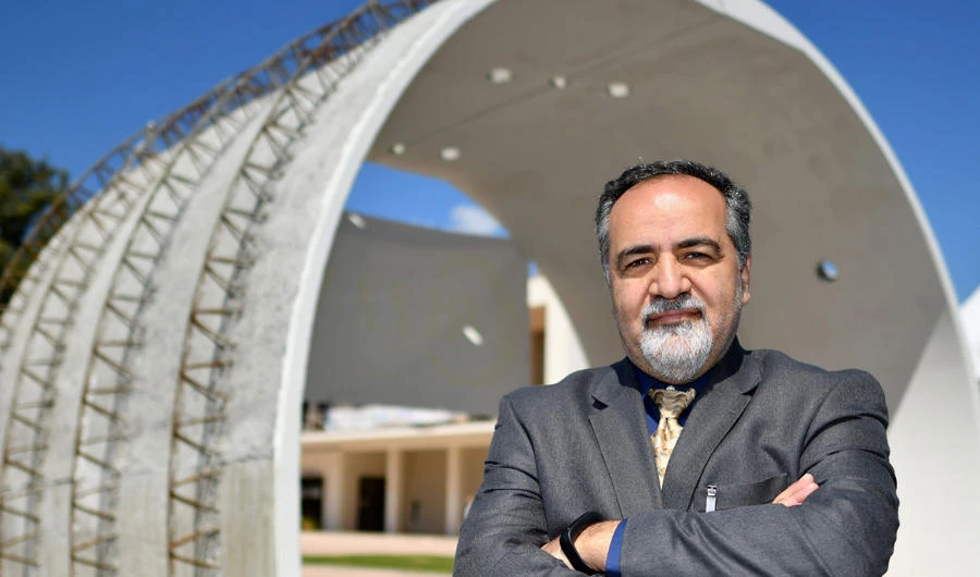 American professor in mining engineering, Jamal Rostami, poses by a concrete tunnel structure within the World Tunnel Congress WTC 2019 on May 7, 2019 in Naples. (AFP / Alberto Pizzoli)