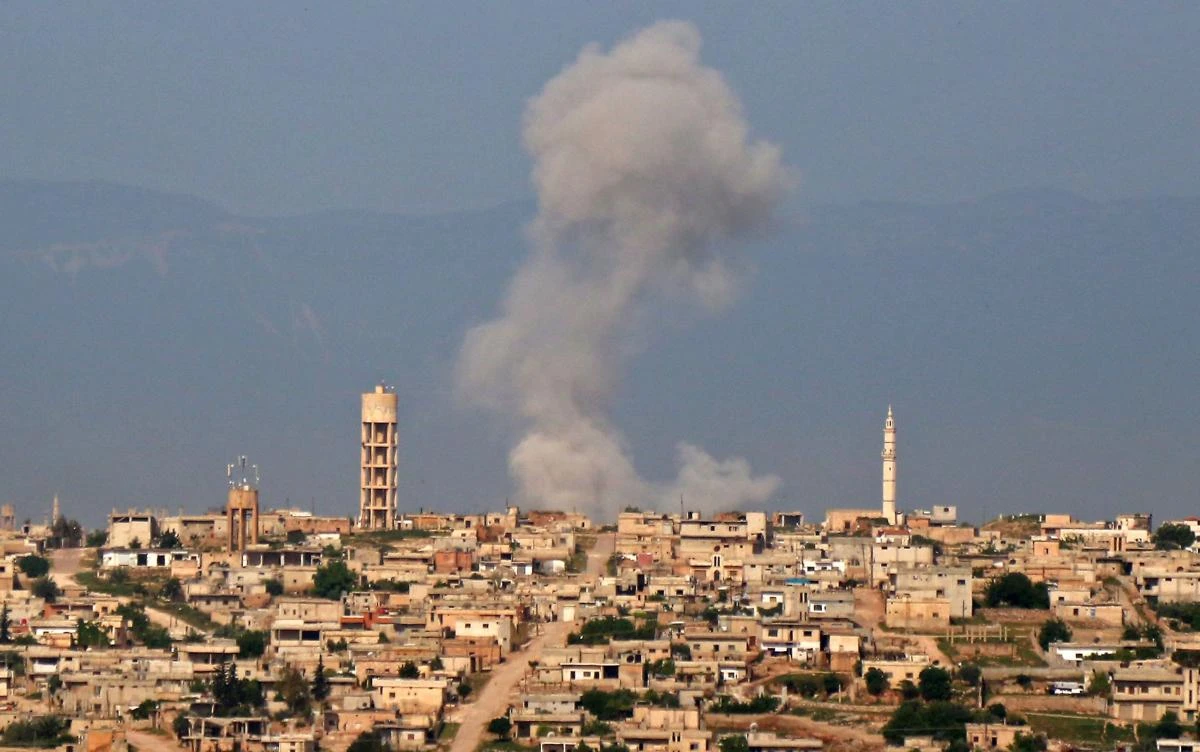 Smoke billows after reported shelling on the Syrian village of Kfar Nabuda in the northern countryside of Hama governorate on May 1, 2019. (File/AFP)