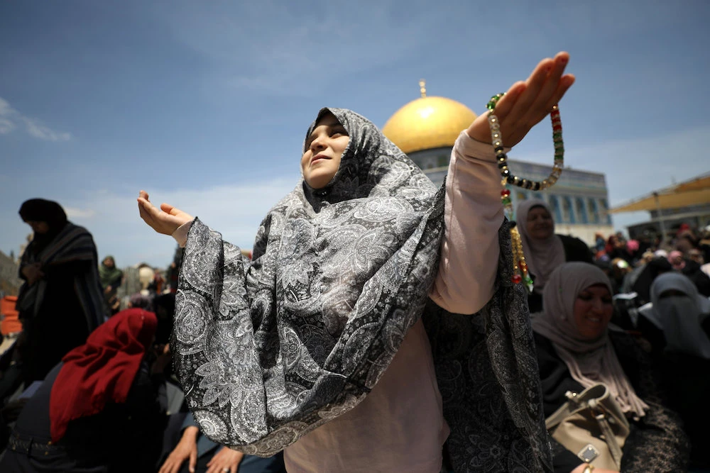 Palestinians pray on the first Friday of the holy fasting month of Ramadan. (Reuters)