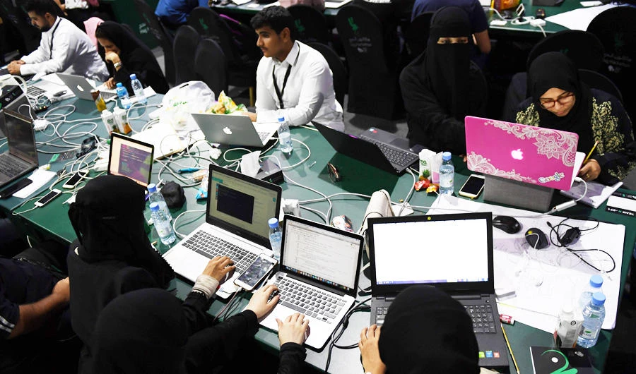Participants including Saudi women attend a hackathon in Jeddah on August 1, 2018, prior to the start of the annual Hajj pilgrimage in the holy city of Makkah. (AFP)