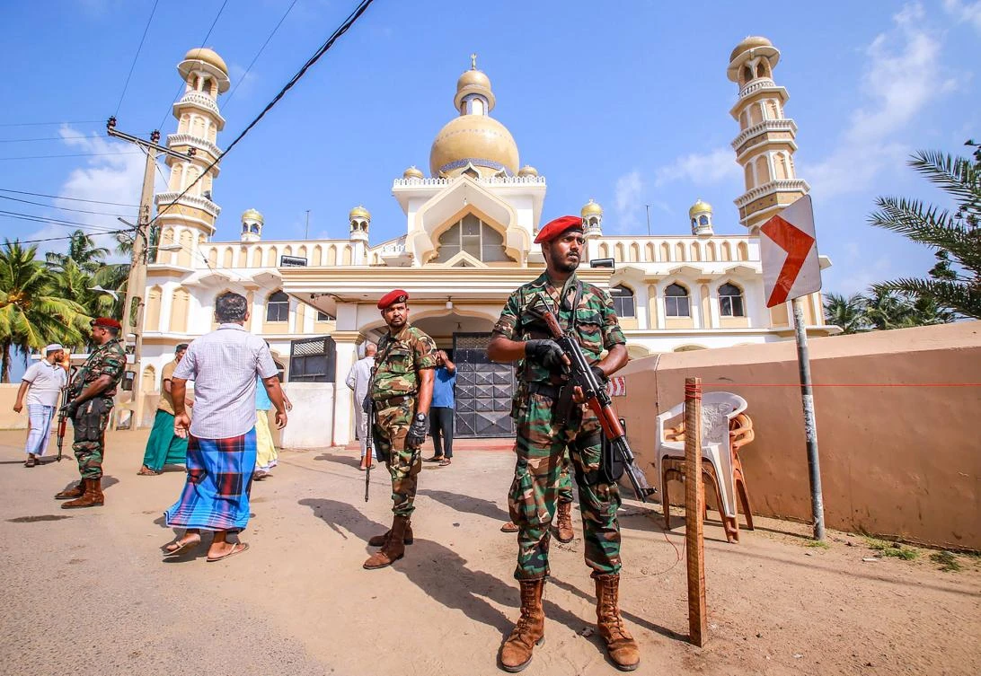 Sri Lankan security personnel stand guard after clashes erupted between Christian and Muslim communities in Negombo. (File/AFP)