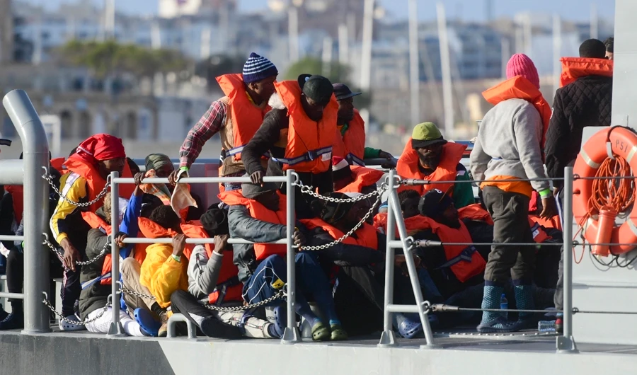 Migrants rescued from the sea off Libya disembark after being transferred to Maltese army boats at sea and brought to Valletta harbor, Malta in this April 13, 2019 photo. Libya on Sunday said its coast guard has also rescued nearly 150 Europe-bound migrants off the country’s Mediterranean coast. (AP file photo)