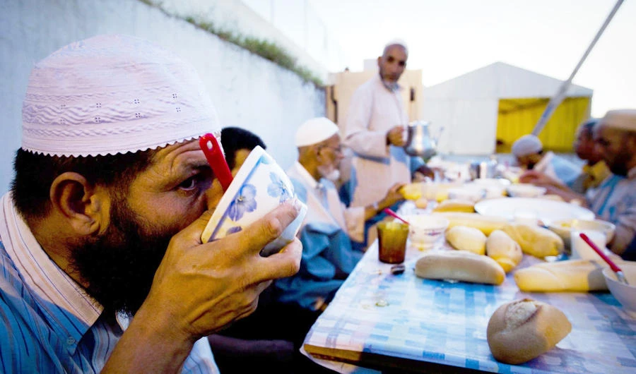 A picture dated 19 August 2010 shows a muslim breaking the fast during Ramadan at a mosque in Melilla, Spain. (Supplied)