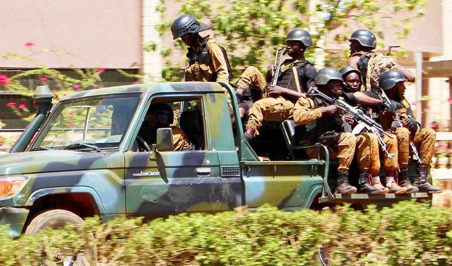 Troops ride in a vehicle in central Ouagadougou, Burkina Faso, March 2, 2018. (AP)