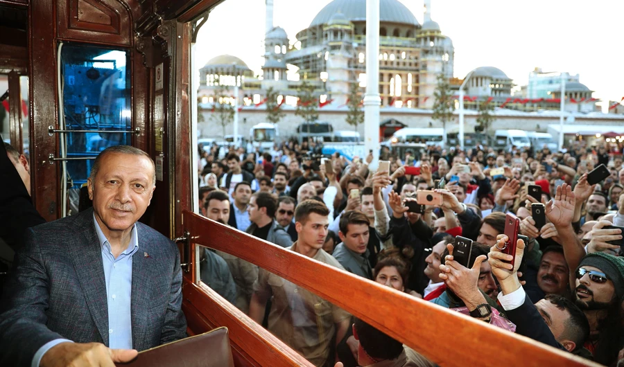 Turkish President Recep Tayyip Erdogan greets his supporters in Istanbul. (AFP)