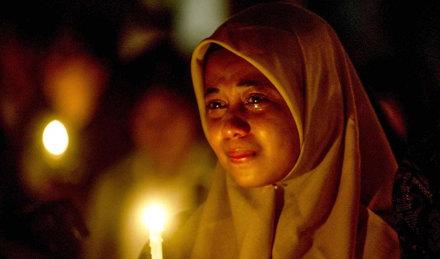 Several hundred people gathered at the Santa Maria church on Monday. (AFP)