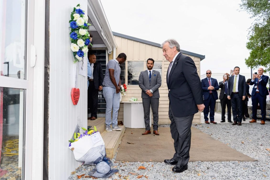 United Nations Secretary-General Antonio Guterres (C) pauses after laying a floral tribute to the victims to the twin mosque attacks at the Linwood Islamic Center in Christchurch on May 14, 2019. (AFP)