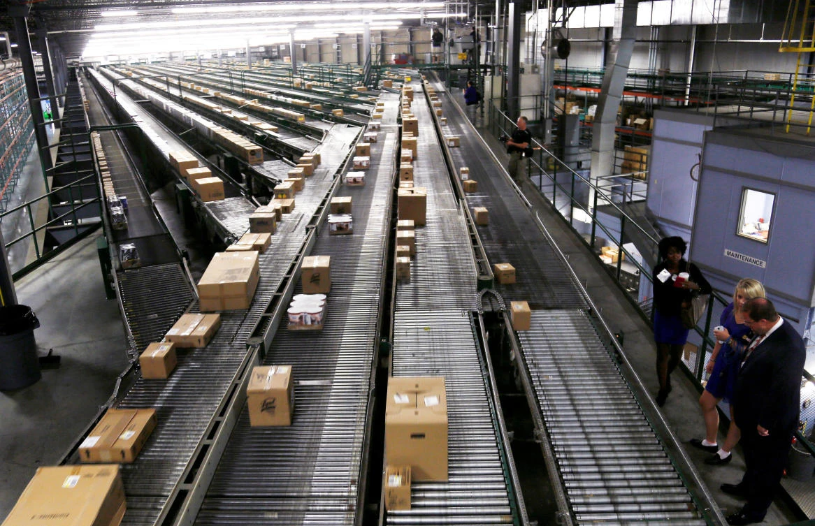 Walmart’s one-day shipping marks the latest salvo in a fight between two retailers that have consistently tried to outdo each other. (Reuters)