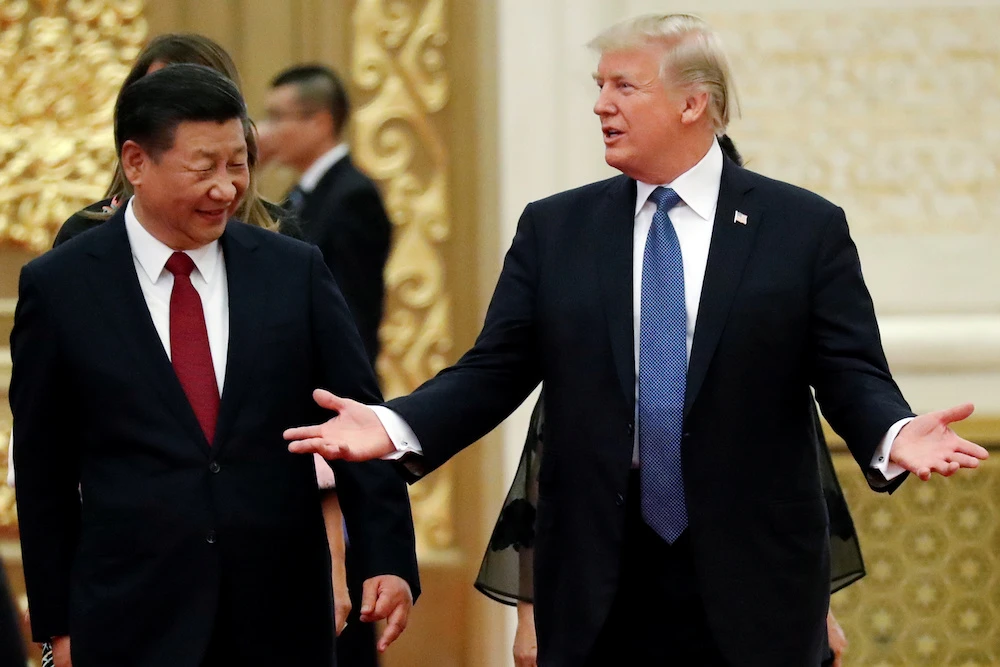 US President Donald Trump and China's President Xi Jinping arrive for a state dinner at the Great Hall of the People in Beijing, China. (File/Reuters)