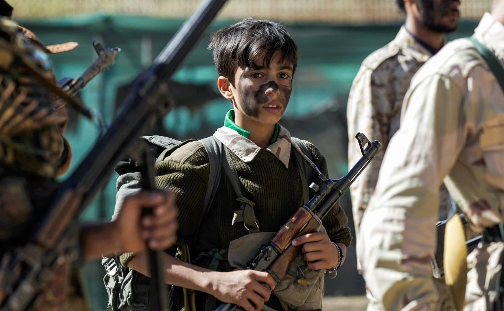A senior Houthi military official has admitted that they have inducted 18,000 child soldiers into their army since the beginning of the war in 2014. (AFP)