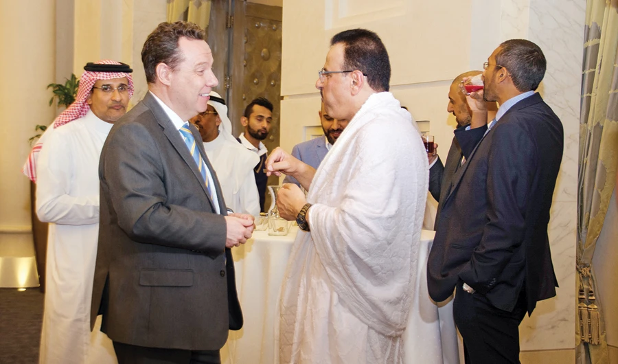 British Consul General Seifeldin Usher meets pilgrims during iftar at the Hilton Makkah and Convention Center. (AN photo by Huda Bashatah)