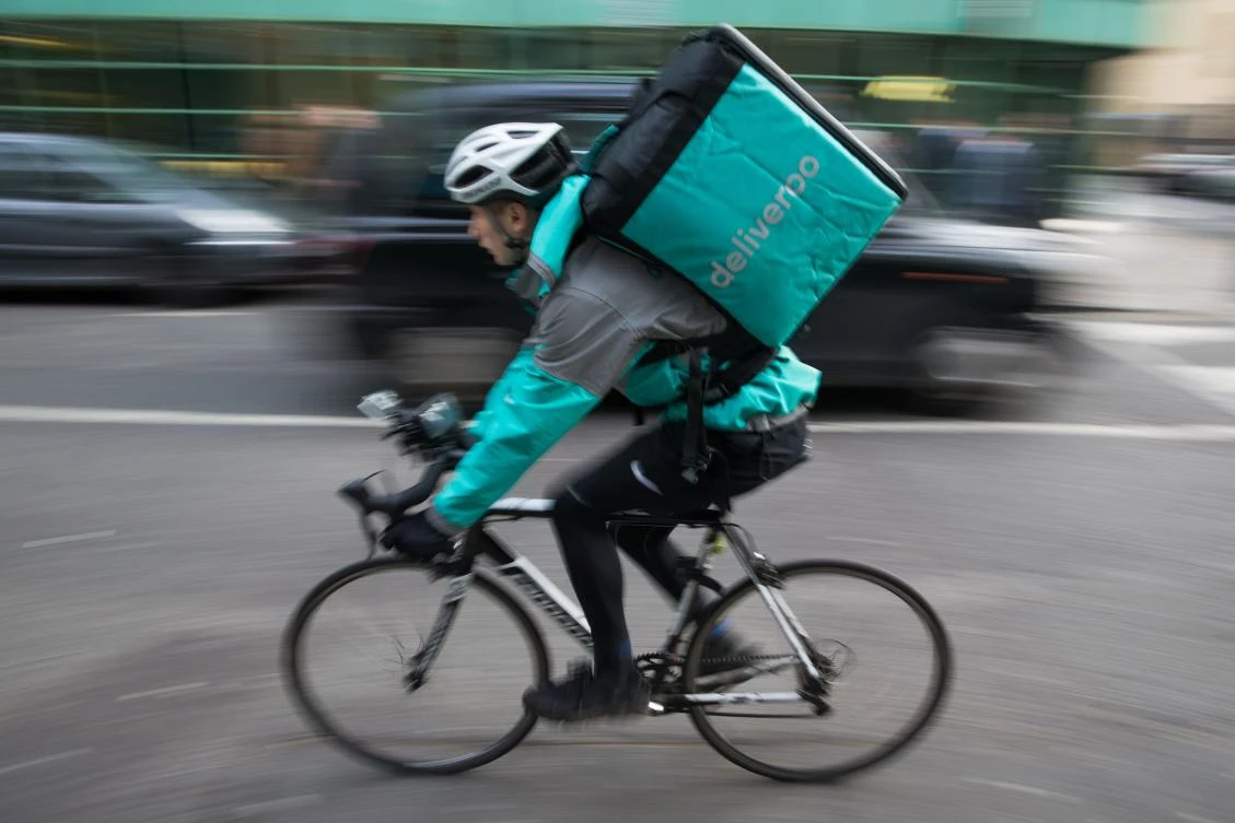 Amazon squares up to Uber with backing for UK food app Deliveroo