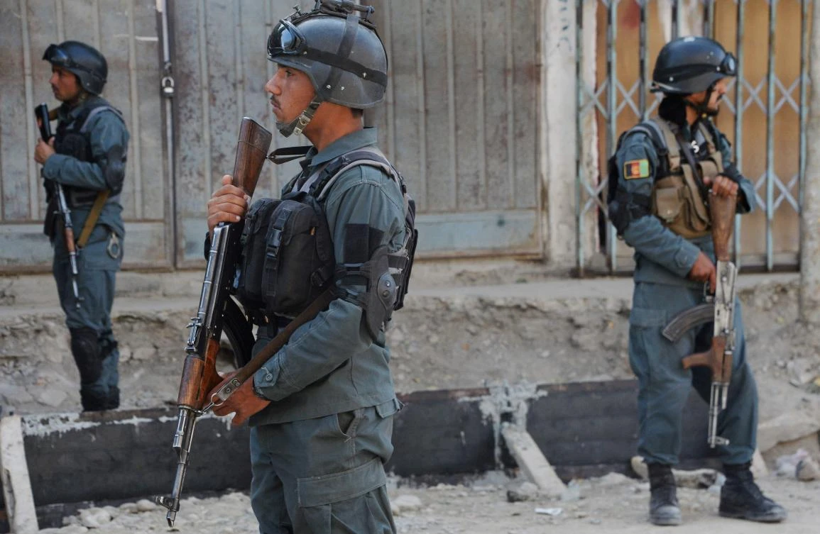 In this file photo taken on September 29, 2017 Afghan policemen stand guard at the site of a suicide bomb attack near a Shiite mosque in Kabul on September. (File/AFP)