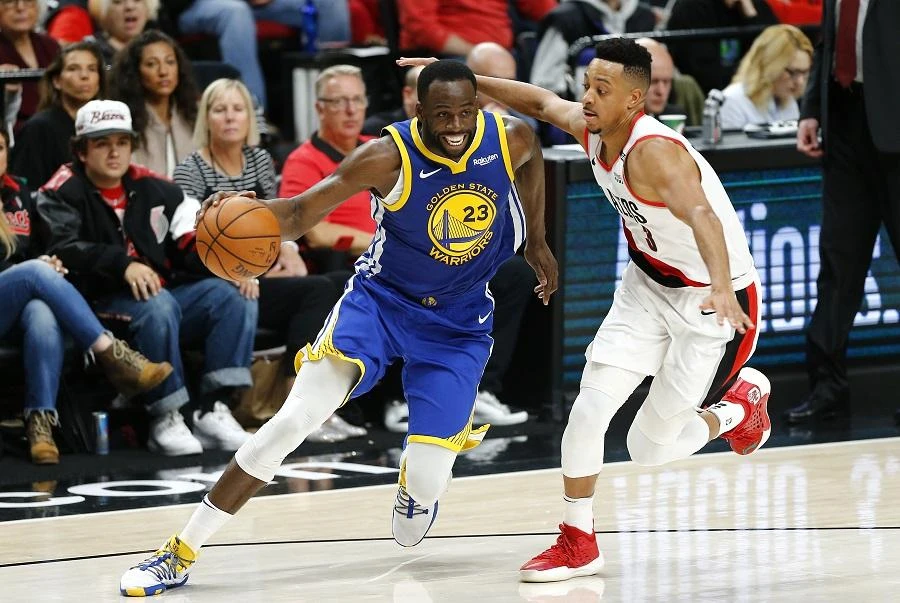 Draymond Green scored 20 points with 13 rebounds and 12 assists, keeping the Warriors afloat in the first half. (AFP)