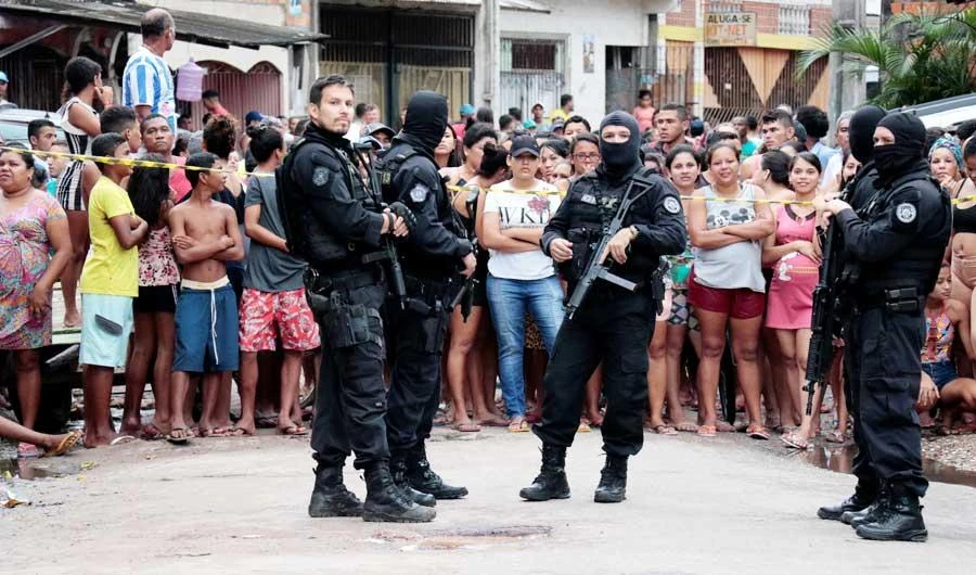 Policemen are seen at a site where, according to local media, an armed group entered and opened fire at a bar, killing and wounding its patrons, in Belem, Para state, Brazil May 19, 2019. (REUTERS)