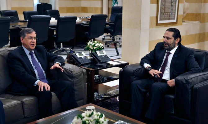 Lebanese Prime Minister Saad Hariri, right, meets with US Deputy Assistant Secretary of State David Satterfield, whose visit in Beirut on May 14, 2019 comes a week after President Michel Aoun presented the US ambassador to Lebanon with a "unified stance" regarding the demarcation of maritime border between Lebanon and Israel. (AP Photo/Bilal Hussein)