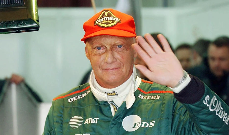 In this file photo taken on January 13, 2002 The Ford-backed Formula One Jaguar racing team boss Niki Lauda waves after testing the last season's Jaguar R2 Formula One at Valencia's racetrack. (AFP)