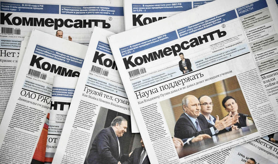 A photo taken on May 20, 2019, shows Kommersant daily newspaper issues. (AFP)
