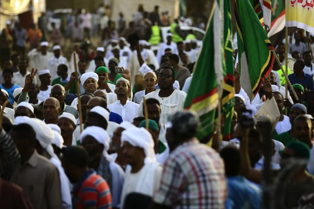 Sudanese demonstrators are worried a military council would leave most of Al-Bashir's regime intact. (AFP/File)