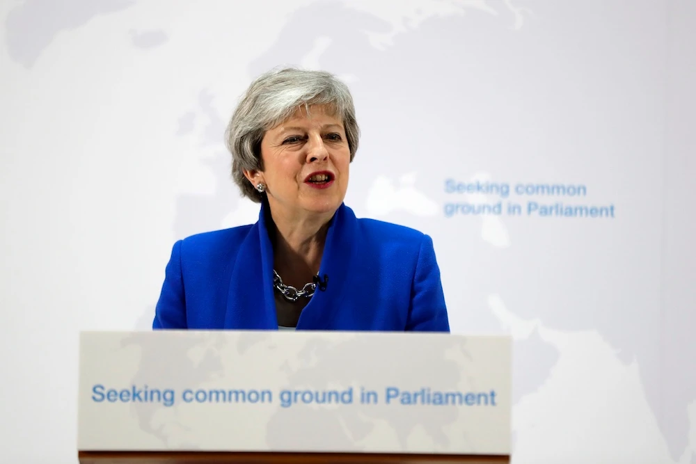 Theresa May said her government will include in her Withdrawal Agreement Bill a requirement for lawmakers to vote on whether to hold another Brexit referendum. (AFP)