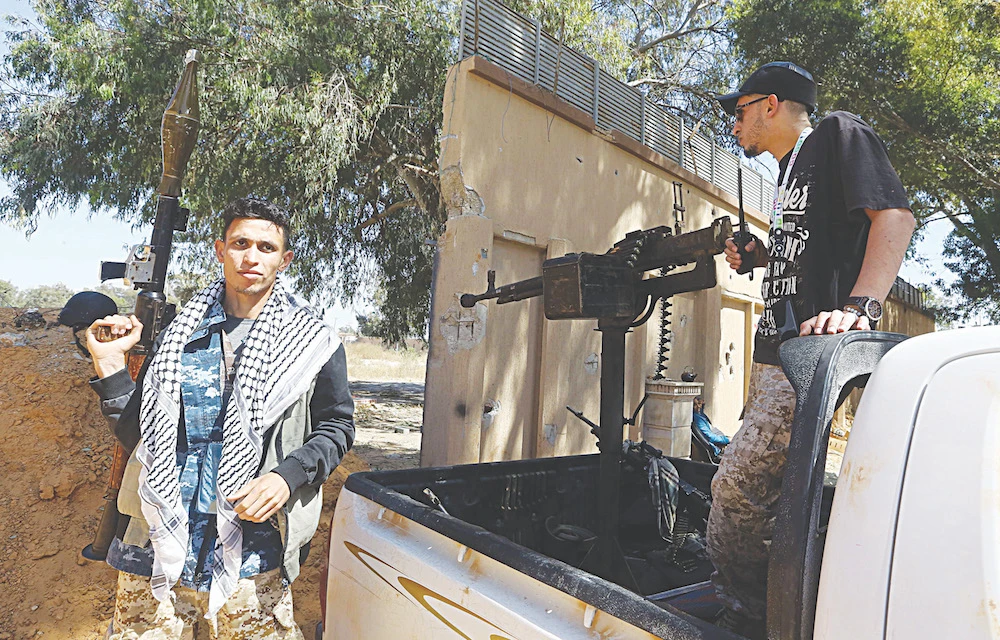 A fighter loyal to the internationally recognized Libyan Government of National Accord in Tripoli on patrol earlier this month. (AFP)