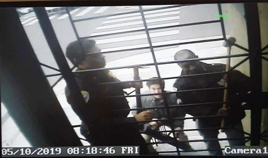 In this May 10, 2019, image from video provided by Bryan Carmody San Francisco police armed with sledgehammers execute a search warrant at journalist Bryan Carmody's home in San Francisco. (AP)
