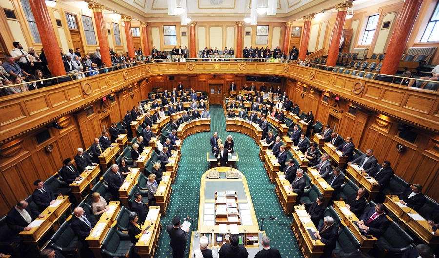 Parliament members attend the New Zealand Parliament session to pay their respects to those who lost their lives in the Christchurch mosque attacks, in Wellington on March 19, 2019.(AFP)