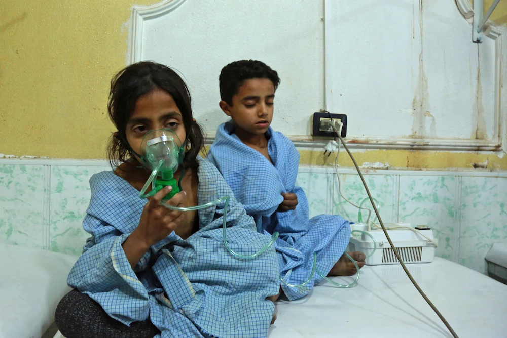 Syrian children receive treatment for a suspected chemical attack in Eastern Ghouta last year. (AFP/File photo)