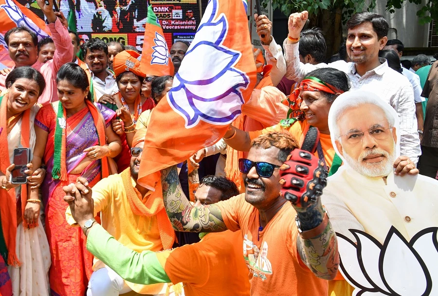 Indian supporters and party workers of Bharatiya Janata Party (BJP) dance as they celebrate on the vote results day for India's general election in Bangalore on May 23, 2019. (Manjunath Kiran/AFP)