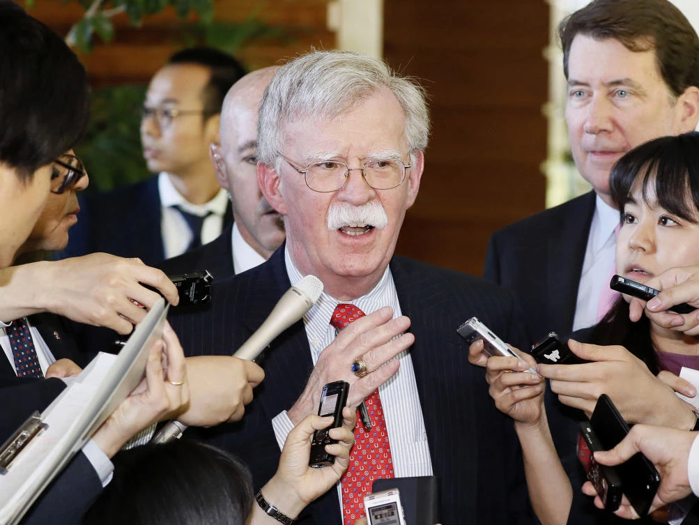 In this Friday, May 24, 2019, photo, U.S. National Security Adviser John Bolton is surrounded by reporters at the prime minister's official residence in Tokyo. (AP)