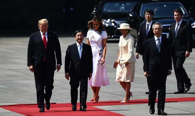 US President Donald Trump, First Lady Melania Trump are accompanied by Japan's Emperor Naruhito and Empress Masako during a welcome ceremony at the Imperial Palace in Tokyo on May 27, 2019. (AFP)