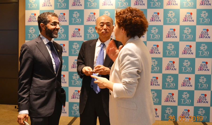Dr. Fahad Al-Turki, head of the Saudi delegation attending the T20 Summit in Tokyo, Japan with Kenichiro Sasae, president of the Japan Institute of International Affairs (JIIA) and Julia Pomares, Executive Director of CIIpp. (AN Photos by Rawan Radwan)