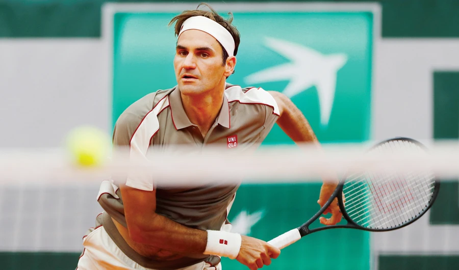 ‘On edge’ Federer makes winning Paris return