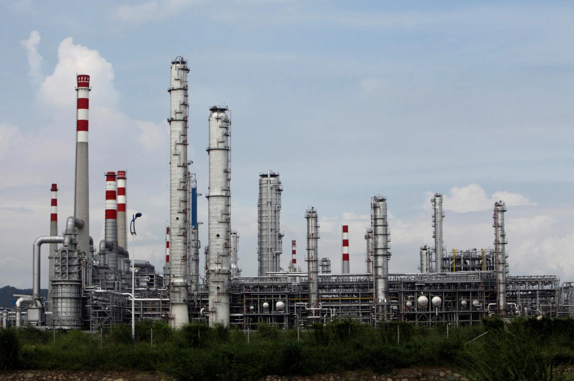 Markets remained tense amid concerns the Sino-US trade war could trigger a broad economic slowdown. Above, a China National Offshore Oil Corporation oil refinery in China’s southern Guangdong province. (Reuters)