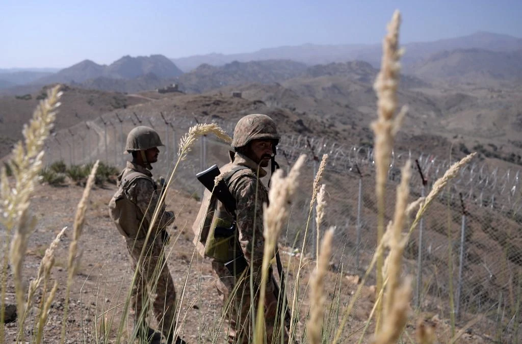 Pakistani soldiers keep vigil next to a newly fenced border fencing along the Afghan border. (AFP)
