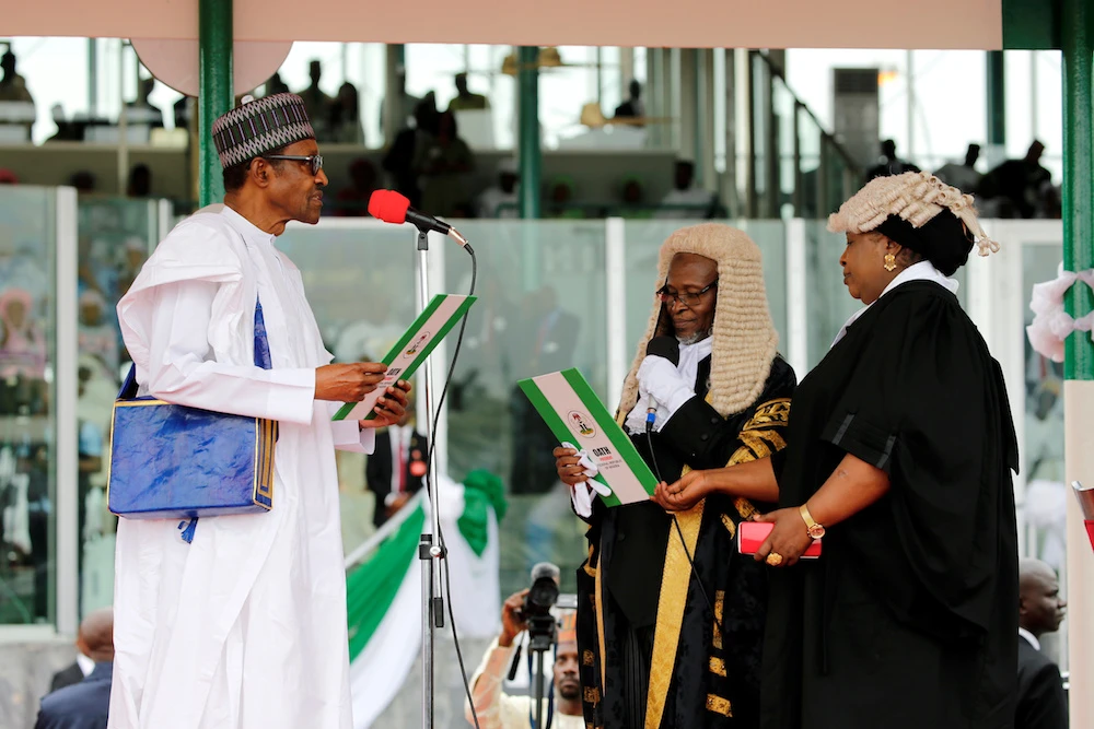 Nigerian President Muhammadu Buhari takes the oath of office during his inauguration for a second term in Abuja, Nigeria, May 29, 2019. (Reuters)