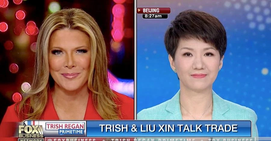 The showdown between Liu Xin (R) of China’s state-run English channel CGTN and Fox Business Network host Trish Regan (L) was aired on Wednesday evening in the United States. (Screengrab)
