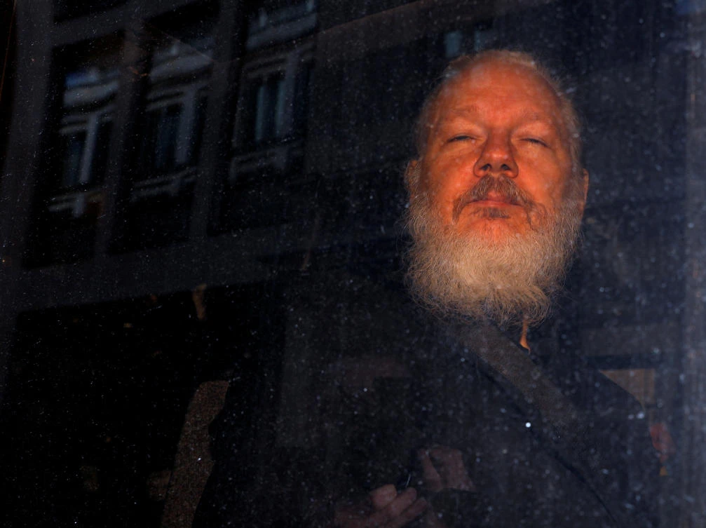 WikiLeaks founder Julian Assange is seen as he leaves a police station in London, Britain April 11, 2019. (Reuters)