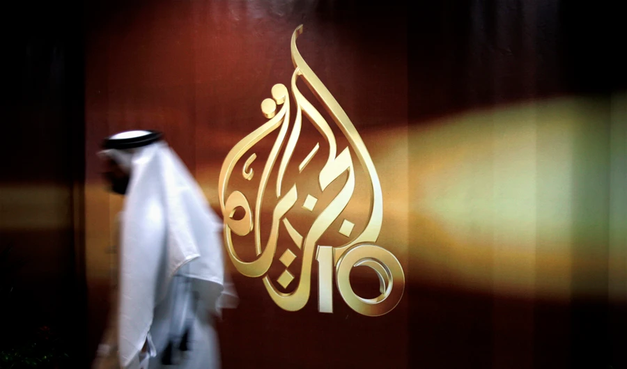 The Qatar-based broadcaster said Sudanese security officers informed it of the decision by the Sudanese Transitional Military Council to shut its office down. (AP)
