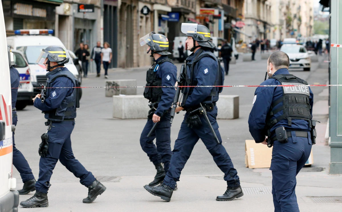 Police officers are seen near the site of a suspected bomb attack in central Lyon, France May 24, 2019. (Reuters)